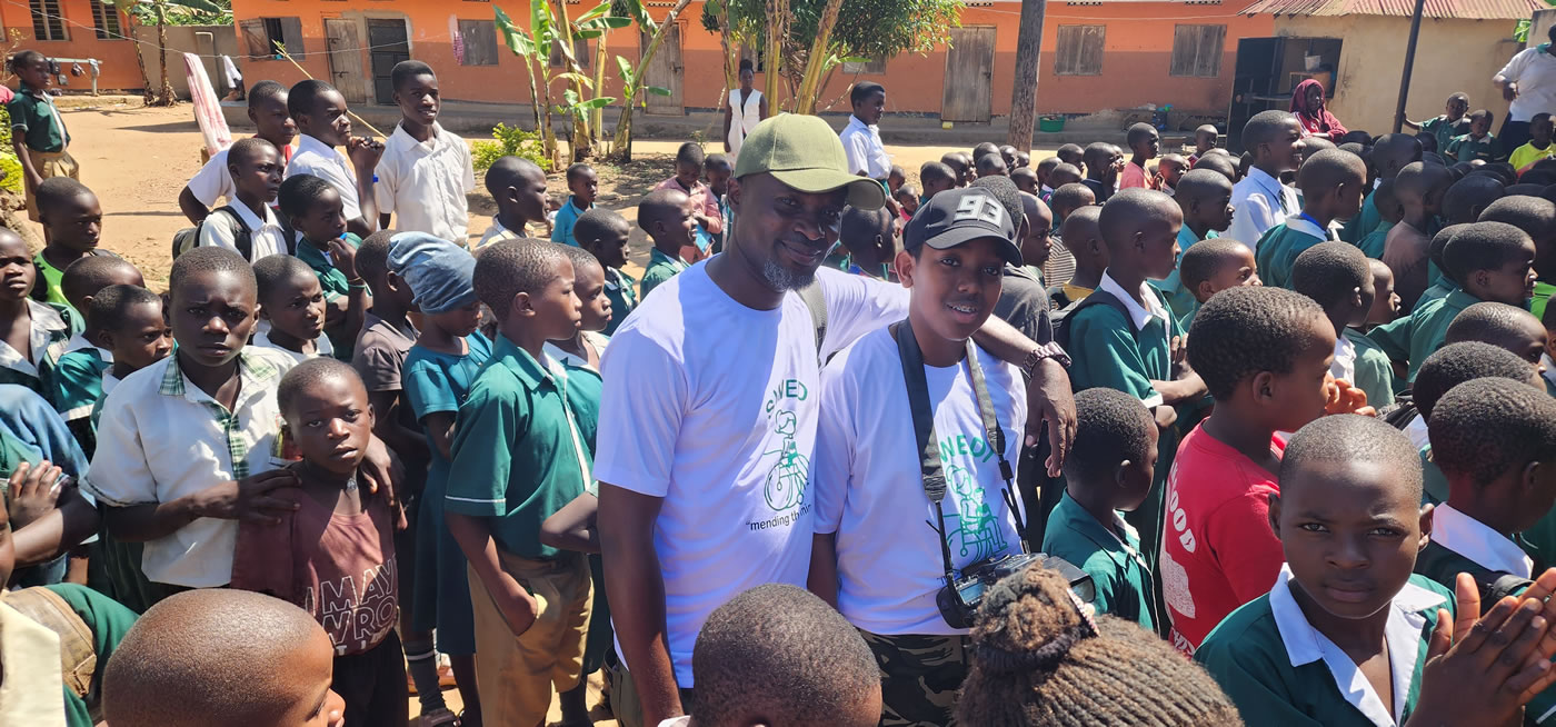 Giving Out Scholastic Materials Kiwawu Cou Primary School